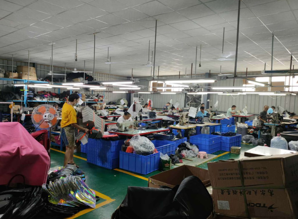Operators working across the factory sewing floor